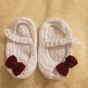 Handmade crocheted baby boots white red bow